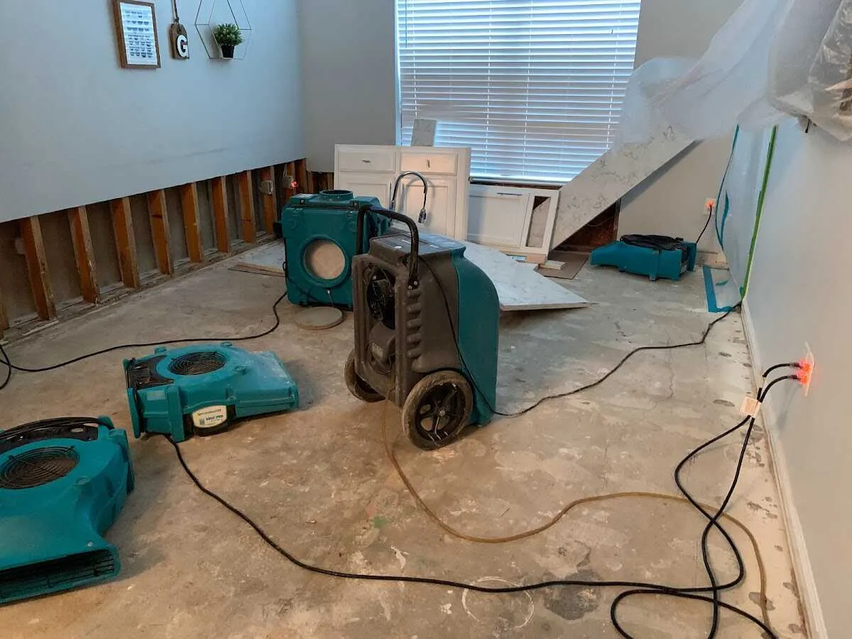Dehumidifier in flood-cut room for Water Damage Restoration in Winterset
